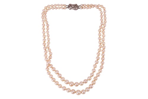 Lot 43 - A double-strand cultured pearl necklace with...
