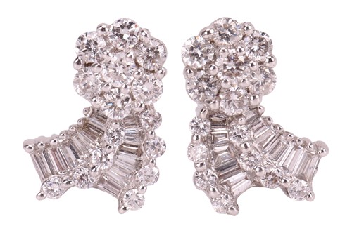 Lot 104 - A pair of diamond-set earrings, stylised as...