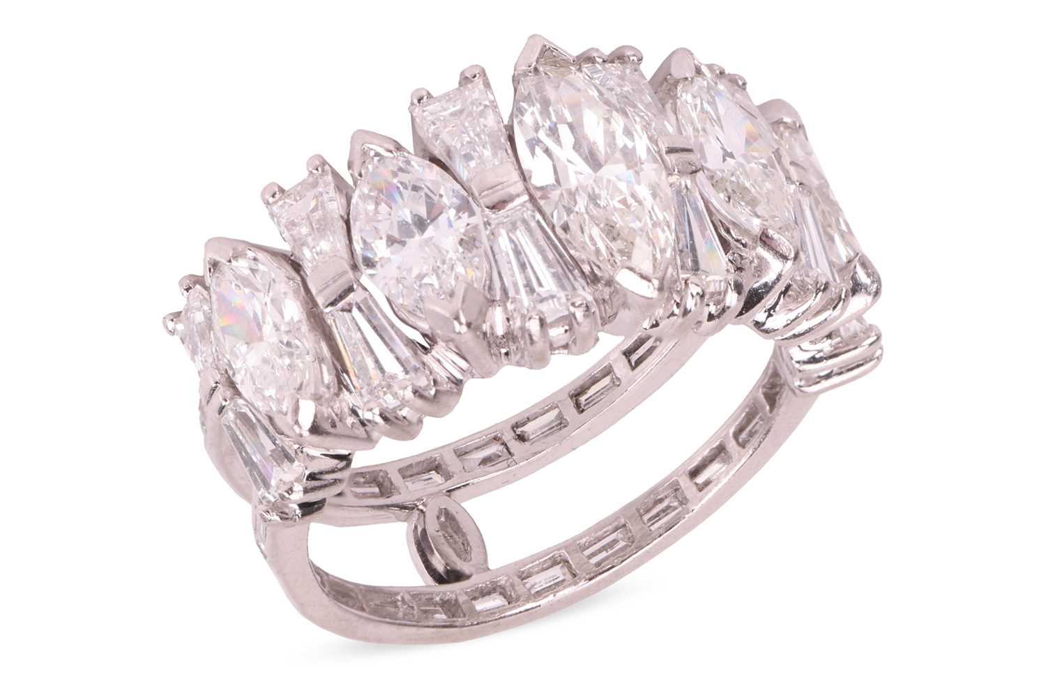 Lot 168 - A diamond-set half-hoop dress ring, composed...
