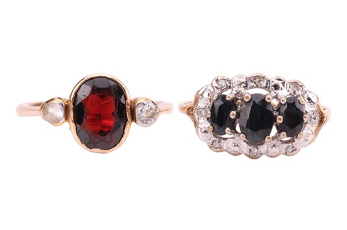 Lot 20 - Two rings; comprising a garnet-set ring,...
