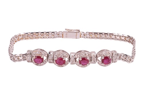 Lot 76 - A ruby and diamond-set bracelet, comprising...