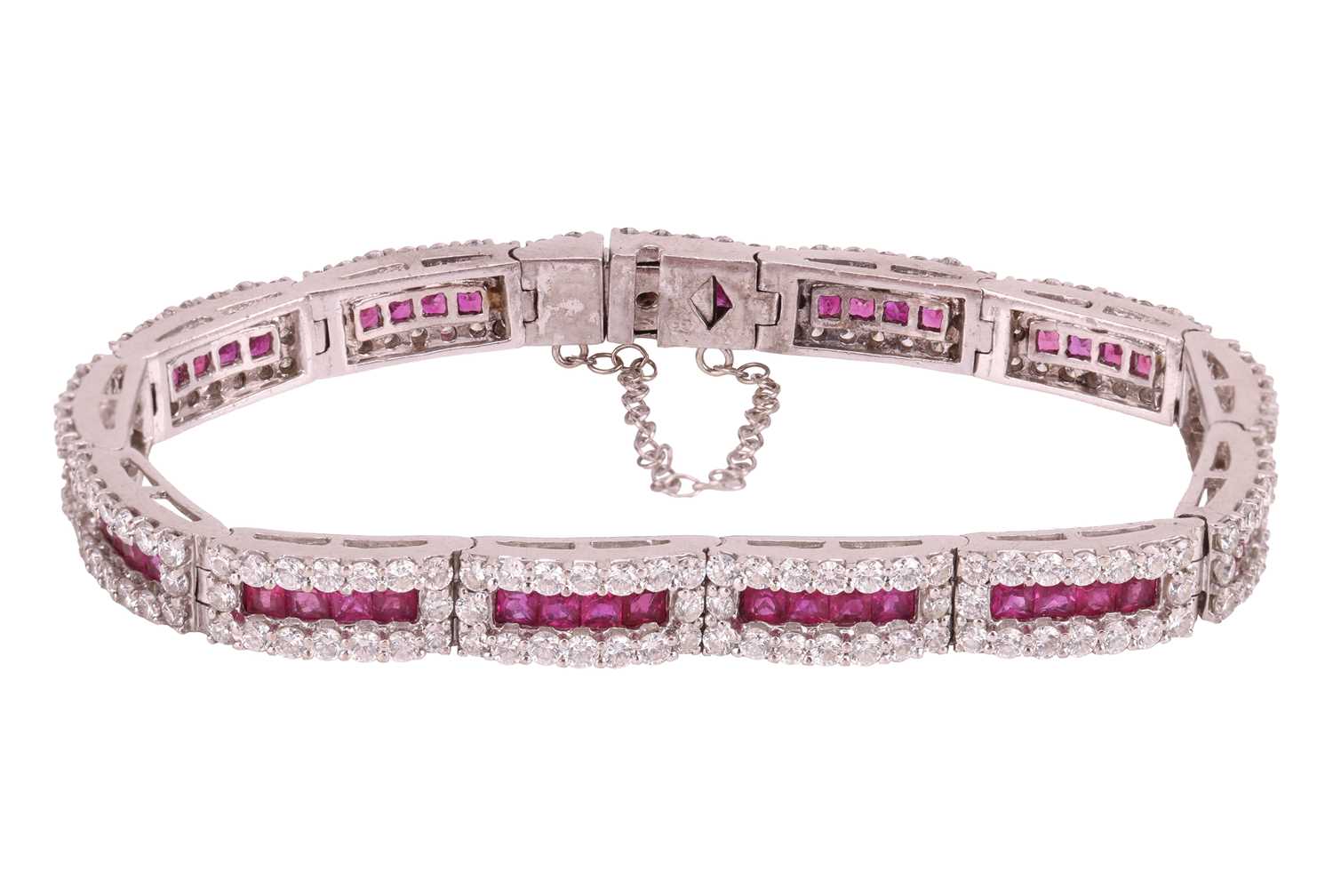 Lot A ruby and diamond line bracelet, each hinged...
