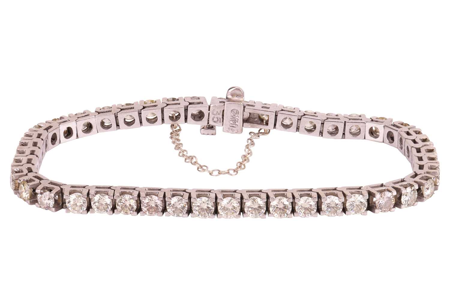 Lot 58 - A diamond-set tennis bracelet, set with...