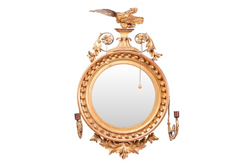 Lot A 19th-century giltwood convex mirror, with...
