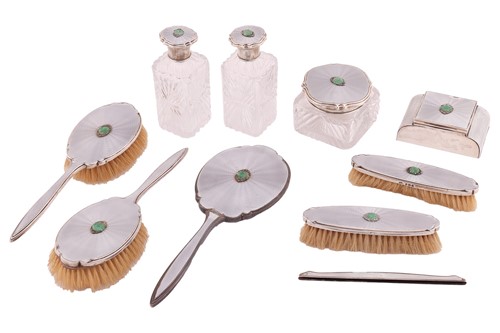 Lot Asprey - A nine piece, silver, guilloché and...