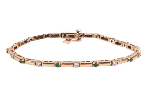Lot A diamond and emerald line bracelet, the...