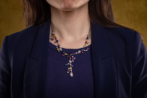 Lot A gem-set necklace set with multi-coloured...