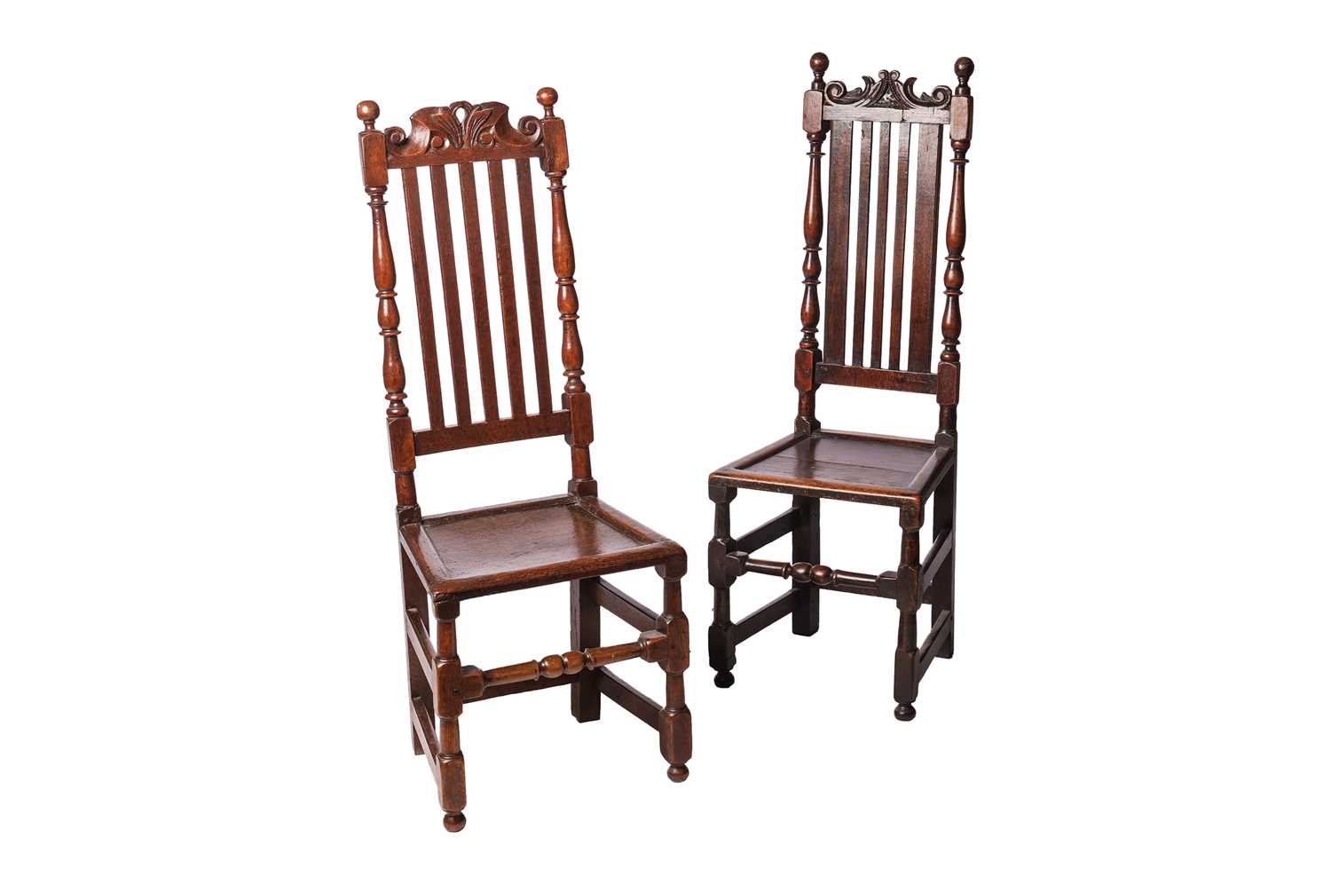 Lot 59 - A near pair of William III oak back-stools,...