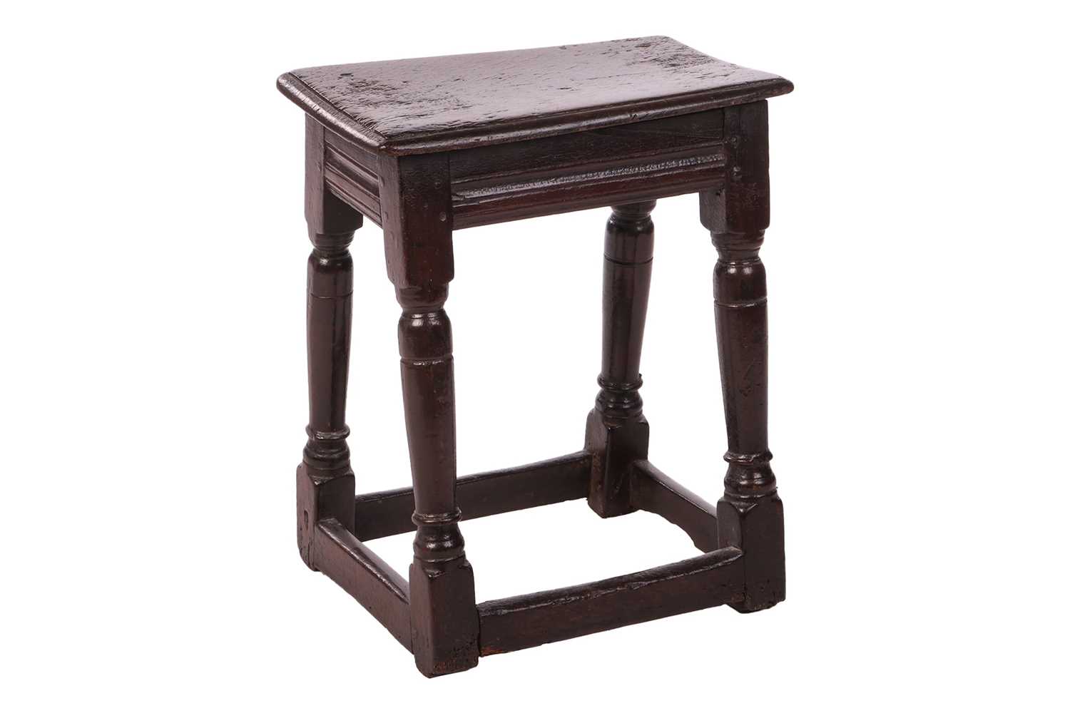 Lot 61 - A Charles II oak joint stool, 54 cm high x 46...