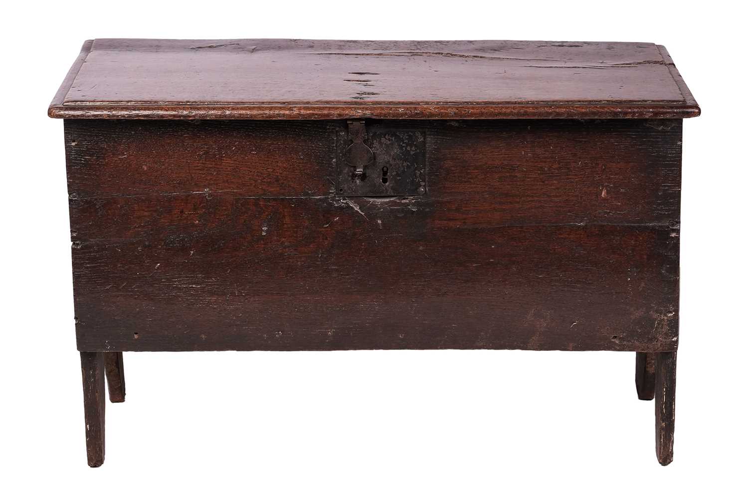 Lot 64 - A late 17th century oak six-plank coffer, on...