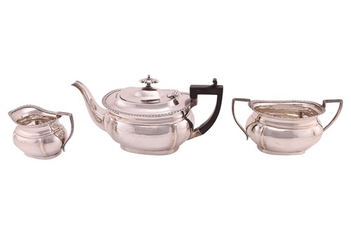 Lot 287 - An Edwardian silver three-piece tea service,...