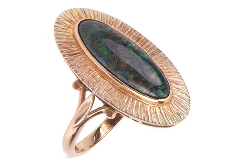 Lot A matrix opal dress ring in 9ct gold,...