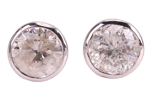 Lot 70 - A pair of diamond stud earrings, each...