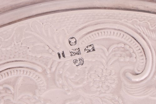 Lot A pair of George III silver salvers, by S C...