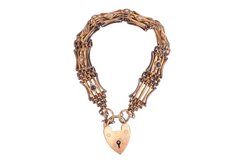 Lot A gem-set gate link bracelet with heart...