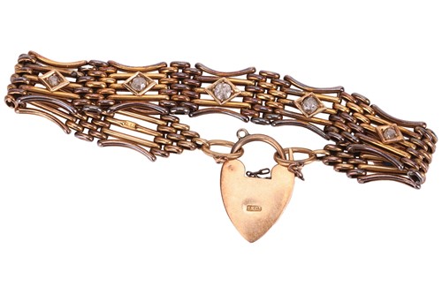 Lot A gem-set gate link bracelet with heart...