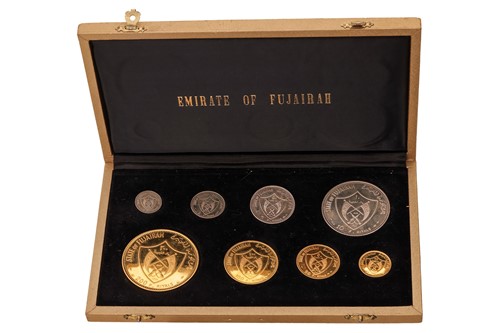 Lot A collection of eight State of Fujairah...