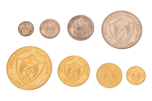 Lot A collection of eight State of Fujairah...