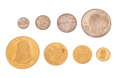 Lot A collection of eight State of Fujairah...