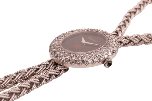 Lot DeLaneu - a diamond-set watch pendant necklace,...