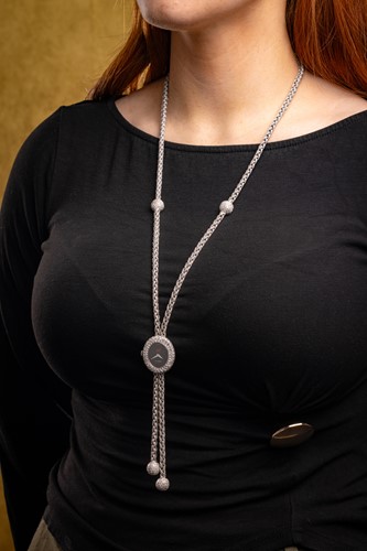 Lot DeLaneu - a diamond-set watch pendant necklace,...