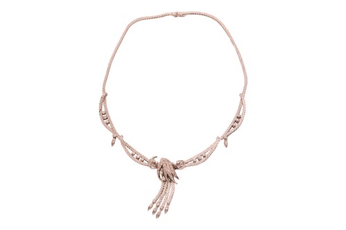 Lot A diamond-set foliate ensemble containing a...