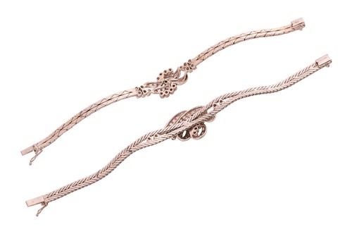 Lot A diamond-set foliate ensemble containing a...