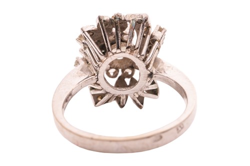 Lot A diamond-set foliate ensemble containing a...