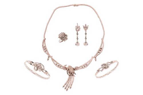 Lot A diamond-set foliate ensemble containing a...