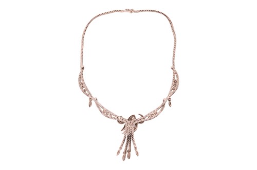 Lot A diamond-set foliate ensemble containing a...