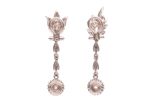 Lot A diamond-set foliate ensemble containing a...