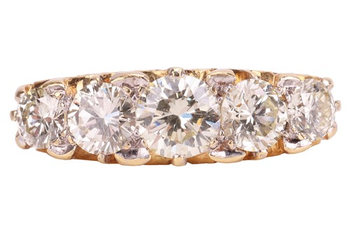 Lot A diamond-set half hoop ring, set with five...