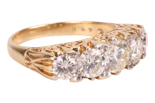 Lot A diamond-set half hoop ring, set with five...