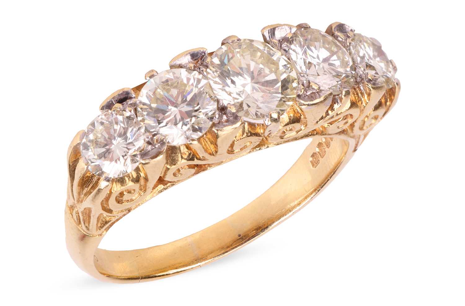 Lot A diamond-set half hoop ring, set with five...