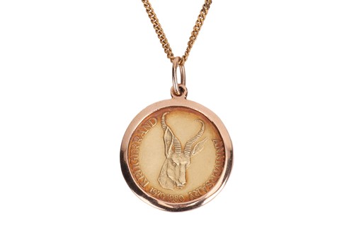 Lot 165 - A Kruggerand pendant necklace, the flat...