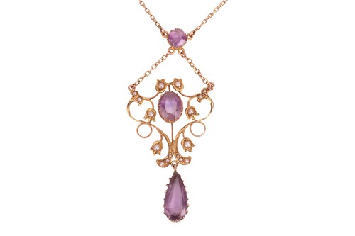 Lot 2 - An Edwardian amethyst and seed pearl pendant...