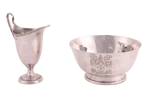 Lot 260 - A hammered silver bowl, circular on stepped...