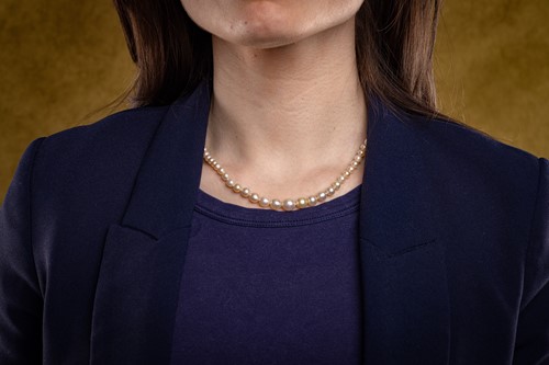 Lot An Edwardian natural saltwater pearl necklace,...