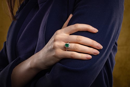 Lot An emerald and diamond-set cluster ring,...