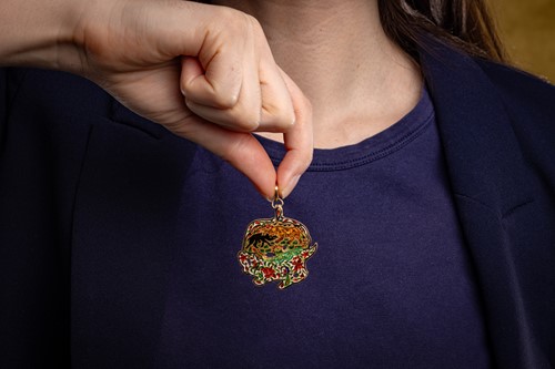 Lot A Mughal polychromatic enamel pendant set with...