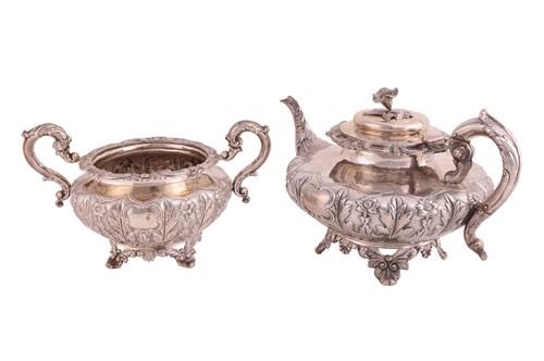 Lot 289 - A heavy-gauge Irish silver two-piece tea set,...