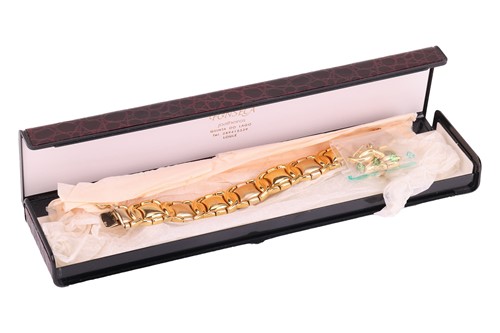 Lot A fancy link bracelet, comprising a series of...