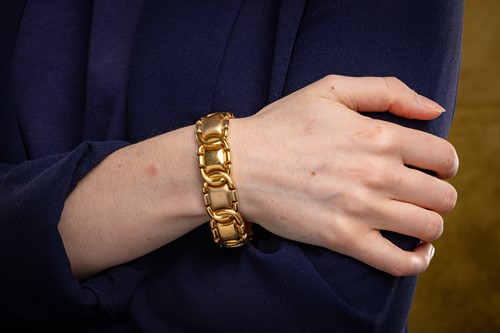 Lot A fancy link bracelet, comprising a series of...