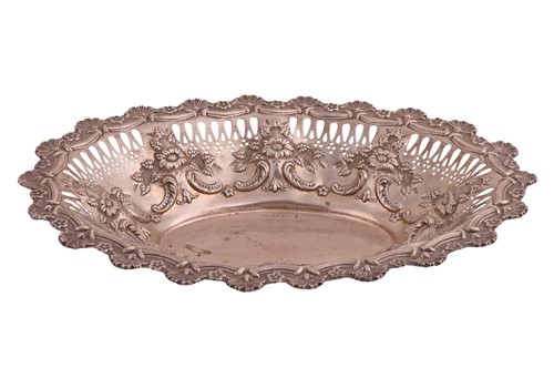 Lot An Edwardian silver pierced fruit basket, by...
