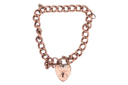 Lot A hollow curb link bracelet in 9ct pink gold,...