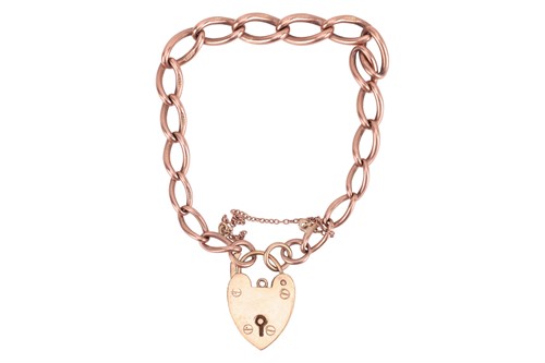 Lot A 9ct gold chain bracelet with heart padlock,...