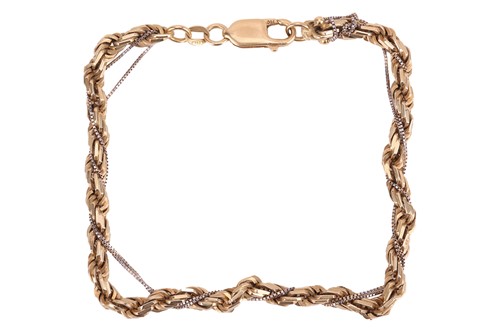 Lot A two-toned twisted rope bracelet, accented...