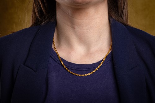 Lot 122 - A loose rope link necklace, completed with an...