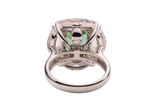 Lot A tourmaline and topaz ring cum pendant, the...