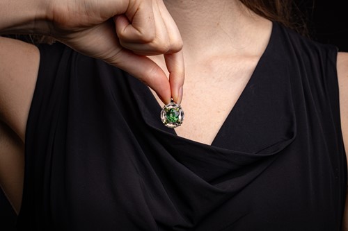 Lot A tourmaline and topaz ring cum pendant, the...